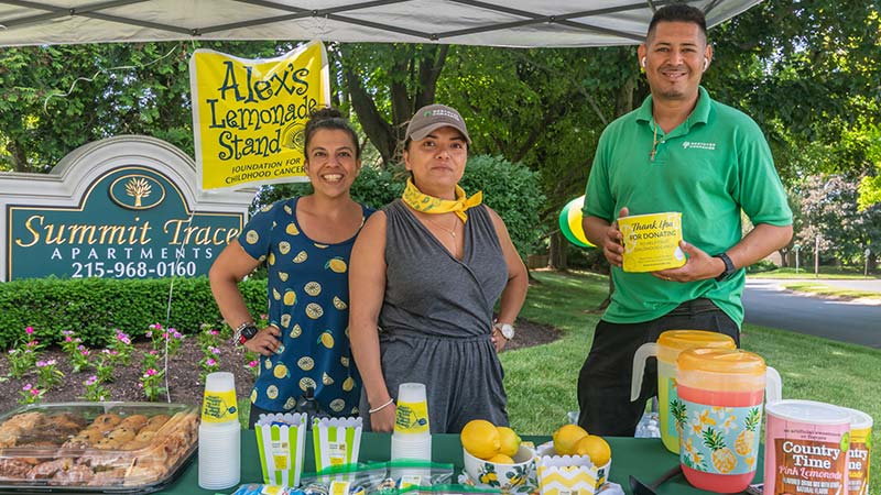 Westover employees running a lemonade stand for a philanthropic event